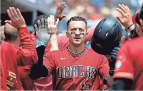  ?? RICK OSENTOSKI/USA TODAY SPORTS ?? Nick Ahmed recalls being stunned on learning he was released after a Diamondbac­ks’ loss to the Rockies in September.