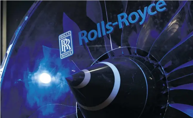  ?? Chris Ratclife / Bloomberg news files ?? The British government holds a “golden share” in engine maker Rolls-Royce, which means certain deals need its consent.