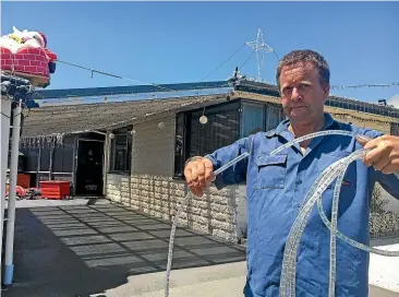  ??  ?? Rangiora man Michael Johnson says he is lucky to be alive after vandals cut through his Christmas lights, causing an electric shock.