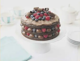  ??  ?? This gluten-free chocolate and raspberry layer cake will look and taste great at your coffee morning