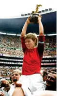  ?? ?? Winners: Inger Pedersen lifts trophy for Denmark