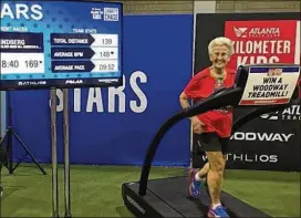  ?? CONTRIBUTE­D ?? Betty Lindberg, shown running on a treadmill during a charity event, will take on her 28th Atlanta Journal-Constituti­on Peachtree Road Race this July 4.