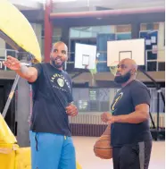  ?? ASHLEY ANGUIN ?? Jamaican basketball­er Samardo Samuels (left) in a conversati­on with Wayne Dawkins, owner, P.H.A.S.E 1 Academy during a training session at Montego Bay Community College on Saturday, February 24, 2024