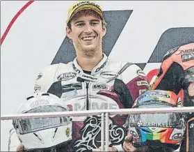  ?? FOTO: SIMONE ROSA ?? Anthony West en el podio de Malasia’12 de Moto2 Este 2º lo perdió por sanción