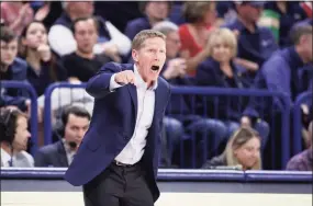  ?? Young Kwak / Associated Press ?? Gonzaga head coach Mark Few shouts to his players during the first half against San Diego in Spokane, Wash., in February. Gonzaga will begin the season at No. 1 for the first time.