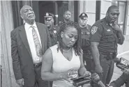  ?? THE ASSOCIATED PRESS ?? Bill Cosby listens to his wife Camille’s statement being read aloud by Ebonee M. Benson on Saturday outside the Montgomery County Courthouse after a mistrial in his sexual assault case in Norristown, Pa.