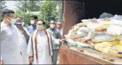  ?? ANI ?? BJP president JP Nadda inspects a truck with Covid relief material meant for the needy, in New Delhi on Sunday.