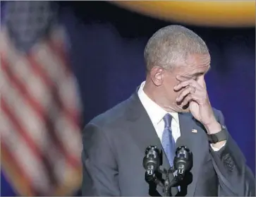  ?? Charles Rex Arbogast Associated Press ?? OBAMA WIPES AWAY tears during his speech. He urged Americans not to “retreat into our own bubbles.” “We have to ... start with the premise that each of our fellow citizens loves this country just as much as we do.”