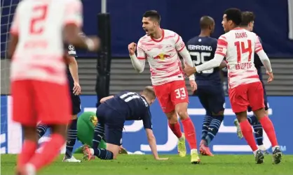  ?? Photograph: DPA/PA ?? RB Leipzig's Andre Silva celebrates scoring his side's second goal against Manchester City.