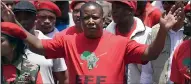  ??  ?? Julius Malema leads supporters of the EFF through the streets of Johannesbu­rg yesterday.