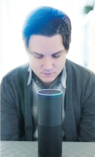  ?? J. P. MOCZULSKI FOR NATIONAL POST ?? Canadian technology writer Patrick O’Rourke sits in his condo in Etobicoke, Ont., with an Amazon Echo, which responds to voice commands.