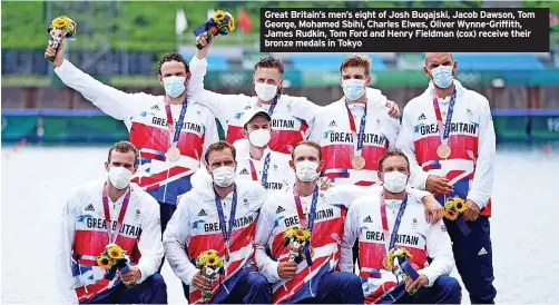  ?? ?? Great Britain’s men’s eight of Josh Bugajski, Jacob Dawson, Tom George, Mohamed Sbihi, Charles Elwes, Oliver Wynne-Griffith, James Rudkin, Tom Ford and Henry Fieldman (cox) receive their bronze medals in Tokyo