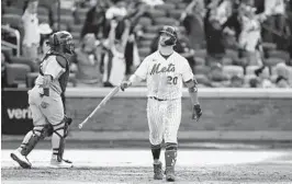  ?? ADAM HUNGER AP ?? The Mets’ Pete Alonso reacts after hitting a walk-off, two-run home run in the 10th inning to beat the Cardinals on Thursday afternoon in New York.