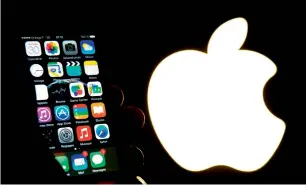  ?? — AFP ?? Apple paid tax rates on European profits on sales of its iPhone and other devices between just 0.005 per cent in 2014.