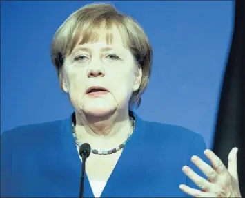  ??  ?? Angela Merkel, Germany’s chancellor, gestures while speaking during a news conference. Merkel’s 2015 decision to open Germany’s borders is seen by many as a reaction to events beyond Germany’s control. However, many segments of German culture have...