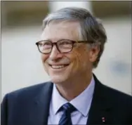  ?? THE ASSOCIATED PRESS ?? Bill Gates, co-chairman of the Bill & Melinda Gates Foundation, talks to the media after a meeting with French President Emmanuel Macron at the Elysee Palace in Paris.