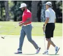  ??  ?? President Obama, right, and Los Angeles Clippers point guard Chris Paul play golf Aug. 7 on Martha’s Vineyard.