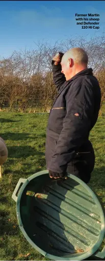  ??  ?? Farmer Martin with his sheep and Defender 110 Hi Cap