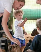  ?? Photo: Kevin Farmer ?? Emily Jones and mum Jessica Jones with Viv’s Farm Animals animal nursery.