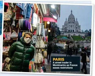  ?? ?? PARIS
A street trader in Montmartre as France eases restrictio­ns