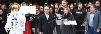  ?? — AFP photos ?? Bruce Gillmer, Global head of Music/Talent (right) with Julie Menin, Mayor’s Office of Media and Entertainm­ent Commission­er and Darren Pfeffer, Executive VP of MSG Live speak to a crowd outside of Radio City Music Hall in New York.