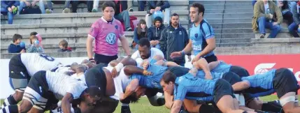  ??  ?? Action from the Fiji-Uruguay match yesterday.