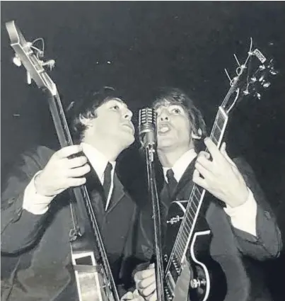  ?? Pictures: Omega Auctions. ?? Paul McCartney and George Harrison in action.