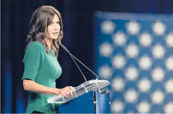  ?? COOPER NEILL/THE NEW YORK TIMES ?? South Dakota’s GOP Gov. Kristi Noem says if she refused aid, it would go to other states.