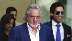  ?? —AFP ?? LONDON: Indian tycoon Vijay Mallya leaves court in central London yesterday.