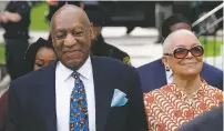  ?? ASSOCIATED PRESS FILE PHOTO ?? Bill Cosby, left, arrives with his wife, Camille, for his sexual assault trial April 24 at the Montgomery County Courthouse in Norristown, Pa. She is calling for a criminal investigat­ion into the prosecutor behind his sexual assault conviction, saying...