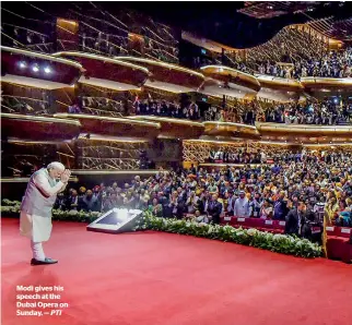  ?? PTI ?? Modi gives his speech at the Dubai Opera on Sunday. —