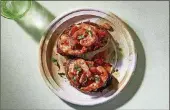  ?? TOM MCCORKLE/THE WASHINGTON POST ?? Shrimp and White Bean Bruschetta is showered with fresh basil.