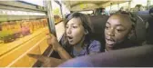  ?? PATRICK BREEN/THE REPUBLIC ?? Manessah Hook (left) and Jareline Villalobos see their new school, Indian Bend.