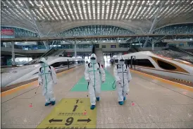  ?? ZHAO JUN — XINHUA VIA AP ?? Experts differ on the whether COVID came from a lab or nature, but getting answers is vital post-pandemic. In this photo released by Xinhua News Agency, firefighte­rs conduct disinfecti­on on the platform of Wuhan Railway Station in Wuhan, central China’s Hubei Province in March of 2020.