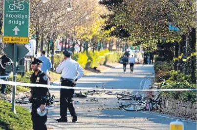  ?? Pictures: AP. ?? Bicycles and debris lies on a cycle path after a motorist drove on to it near the World Trade Center memorial. Below: the damaged Home Depot truck driven by the attacker.