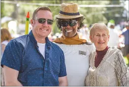  ?? Chris Torres/The Signal ?? Santa Clarita Mayor Pro Team Jason Gibbs, left, Oriana John of the Child and Family Center, middle, and Santa Clarita Mayor Laurene Weste, right, pose for a photo at the Taste of the Town event at Blomgren Ranch in Santa Clarita on Sunday.
