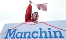  ?? Photograph: Patrick Smith/Getty Images ?? A supporter holds a Manchin sign in Charleston, West Virginia, on 6 November.