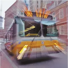  ?? STAFF FILE PHOTO BY MATT STONE ?? ALL ABOARD: An MBTA bus drives up State Street.