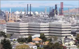  ?? LAURA A. ODA — STAFF ARCHIVES ?? New air district rules are aimed at neighbors of Chevron’s Richmond refinery.