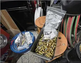  ?? JOSE CARLOS FAJARDO — BAY AREA NEWS GROUP ?? Ammunition and evidence bags from the Contra Costa County Sheriff’s Department are photograph­ed at the home of John King in Clayton in February 2021.