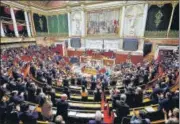  ?? REUTERS ?? Members of parliament applaud after a vote to enshrine abortion rights in the constituti­on, at the National Assembly in Paris.