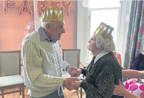  ??  ?? SPECIAL DAY: Gerry and Ena Smith on their platinum wedding anniversar­y at Orchar Nursing Home, Broughty Ferry.
