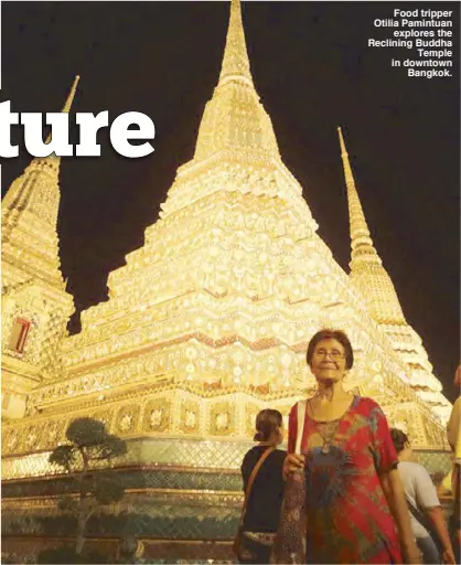  ??  ?? Food tripper Otilia Pamintuan explores the Reclining Buddha Temple in downtown Bangkok.