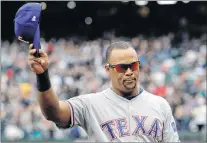  ?? AP PHOTO ?? Texas Rangers’ Adrian Beltre tips his cap as he walks off the field during the fifth inning of a game against the Seattle Mariners in Seattle on Sept. 30.