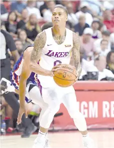 ??  ?? In this file photo taken on July 6, 2019 Joe Young #0 of the Los Angeles Lakers shoots against the LA Clippers during the 2019 NBA Summer League at the Thomas & Mack Center in Las Vegas, Nevada.