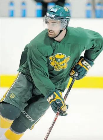  ?? SHAUGHN BUT TS/EDMONTON JOURNAL ?? Sean Ringrose, captain of the top-ranked U of A Golden Bears, practises at Clare Drake Arena.