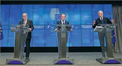  ?? JOHN THYS / AFP ?? President of the European Commission Jean-Claude Juncker (left), European Council President Donald Tusk and EU chief Brexit negotiator Michel Barnier meet reporters after a special meeting of the European Council to endorse the draft Brexit withdrawal agreement and to approve the draft political declaratio­n on future EU-UK relations on Sunday in Brussels.