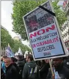 ??  ?? Les agents ont marché jusqu’aux Champs-Elysées, mercredi.