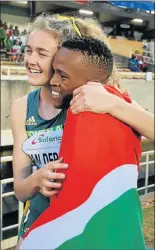  ?? Picture: GALLO IMAGES ?? HURDLES CHAMPS: South Africans Zeney van der Walt and Sokwakhana Zazini embrace after each won their 400m hurdles finals at the IAAF World U18 Championsh­ip in Nairobi at the weekend