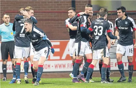  ??  ?? Dundee’s comeback against Hearts will have given everyone at Dens a huge confidence boost.